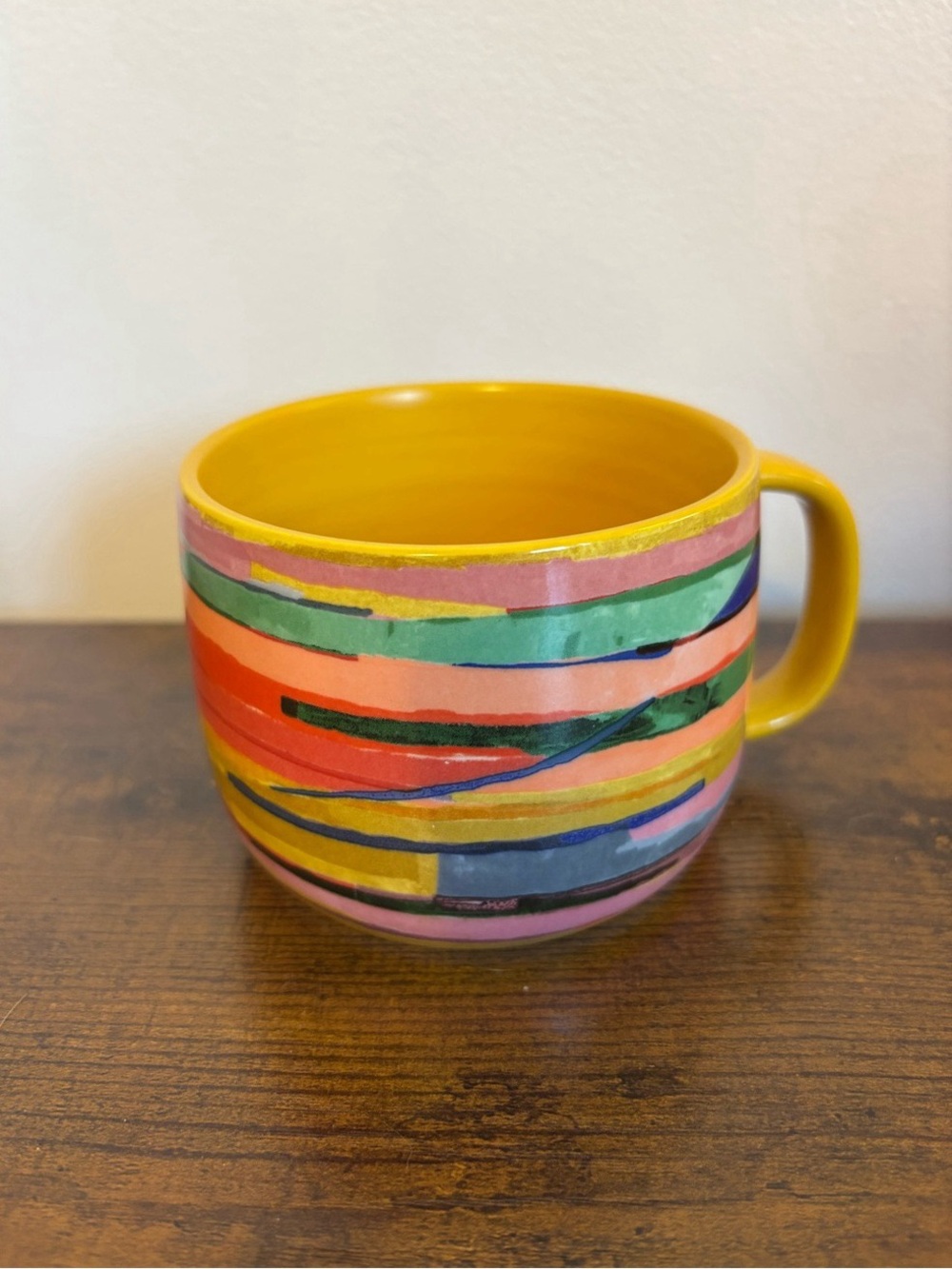 Hand-Painted Striped Ceramic Mug in Yellow Interior